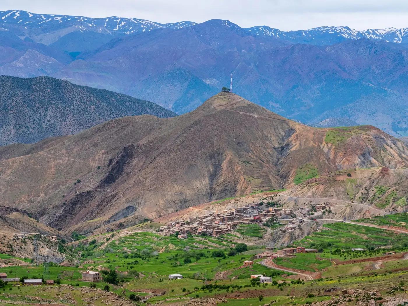 Breathtaking view of the Atlas Mountains and a traditional village in Morocco.