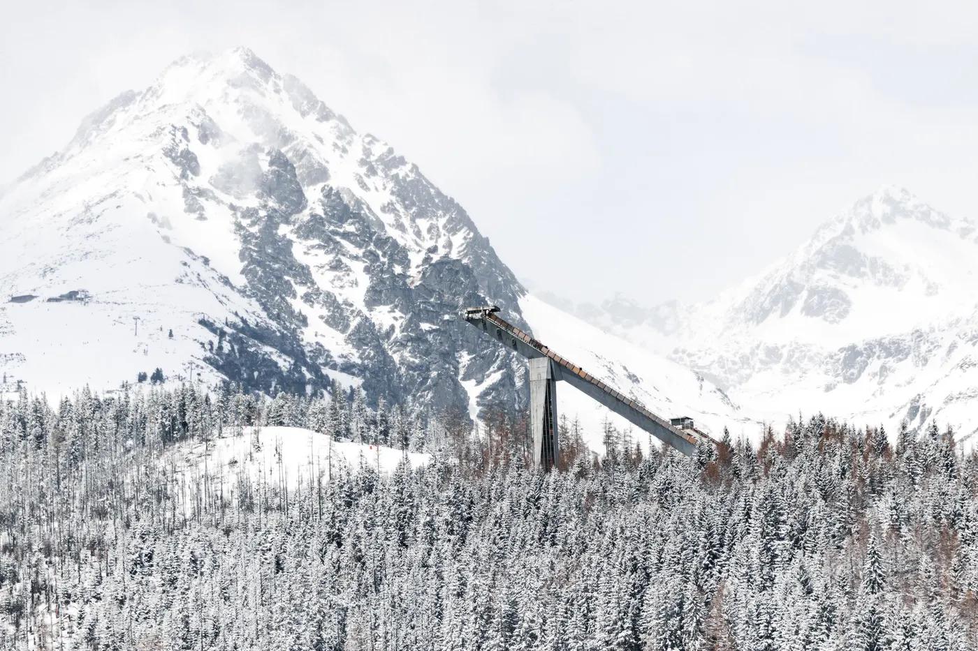 Breathtaking view of Vysoké Tatry mountains covered in snow, showcasing winter's beauty.