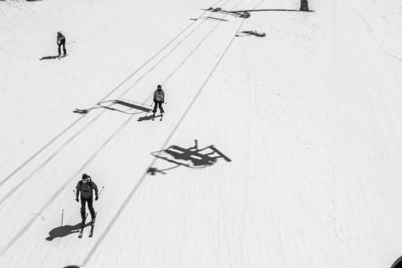 Aerial view of skiers enjoying a winter day on the slopes of Vail, Colorado.