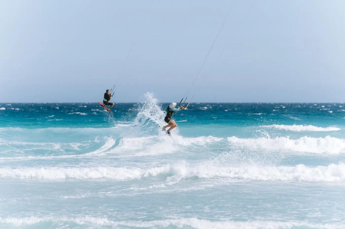Dynamic kitesurfing scene on the vibrant blue waters of Esperance, Australia.